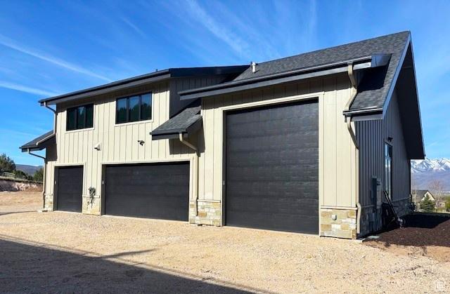 2508 E 70 S Unit 4, Heber City, UT 84032 - view of front of house featuring stone siding and driveway