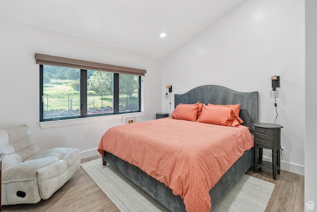 2508 E 70 S Unit 4, Heber City, UT 84032 - bedroom with lofted ceiling, wood finished floors, baseboards, and recessed lighting