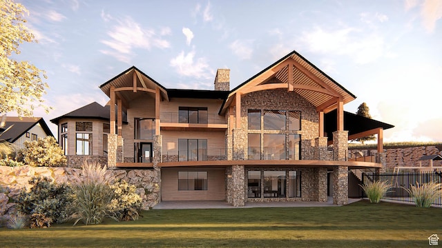 2508 E 70 S Unit 4, Heber City, UT 84032 - rear view of house with stone siding, a balcony, a chimney, and a patio