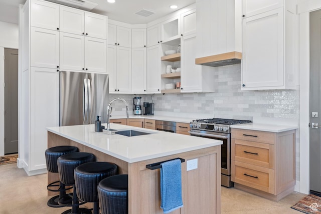 2508 E 70 S Unit 4, Heber City, UT 84032 - kitchen with a sink, stainless steel appliances, a breakfast bar area, tasteful backsplash, and recessed lighting
