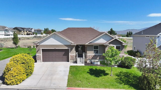 1467 S Lake View Ter, Saratoga Springs, UT 84045 - craftsman-style home featuring a garage, a front yard, stone siding, and concrete driveway