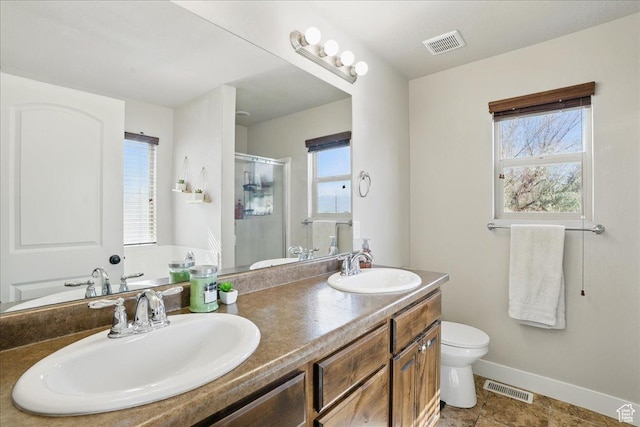 1467 S Lake View Ter, Saratoga Springs, UT 84045 - bathroom featuring toilet, a stall shower, baseboards, and double vanity