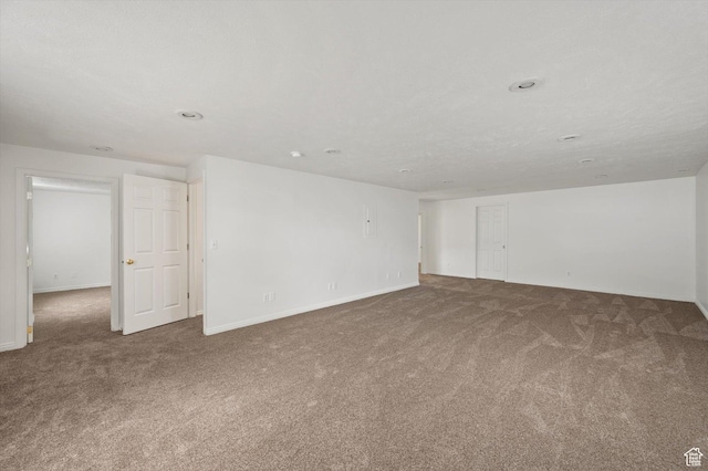 5094 W Pebblerock Cir S, West Jordan, UT 84081 - carpeted spare room featuring baseboards and recessed lighting