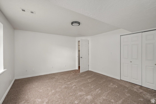 5094 W Pebblerock Cir S, West Jordan, UT 84081 - unfurnished bedroom featuring carpet, baseboards, a closet, and a textured ceiling