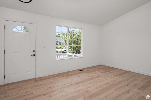 5094 W Pebblerock Cir S, West Jordan, UT 84081 - entryway with light wood-style floors, plenty of natural light, and baseboards