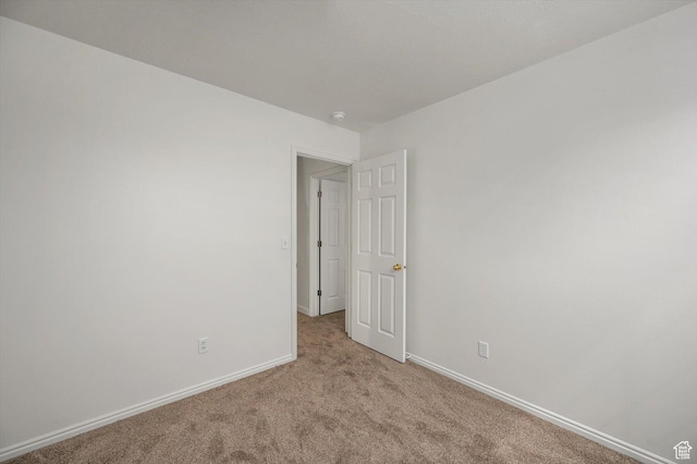 5094 W Pebblerock Cir S, West Jordan, UT 84081 - spare room featuring carpet flooring, baseboards, and a smoke detector