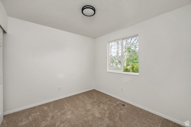 5094 W Pebblerock Cir S, West Jordan, UT 84081 - empty room with carpet and baseboards