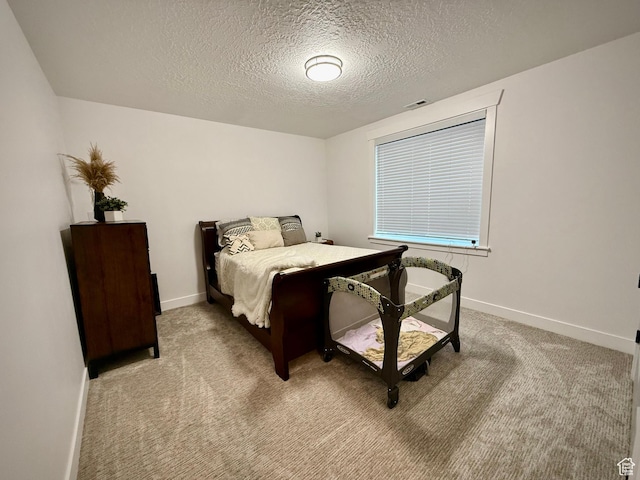 268 N 1400 W, Midway, UT 84049 - bedroom featuring a textured ceiling, light colored carpet, and baseboards