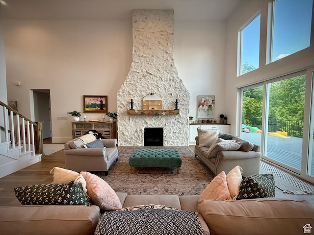 268 N 1400 W, Midway, UT 84049 - living area with a high ceiling, wood finished floors, healthy amount of natural light, stairway, and baseboards