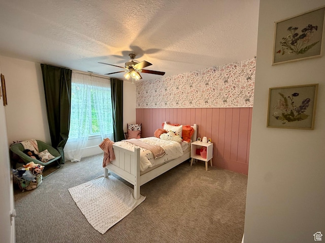 268 N 1400 W, Midway, UT 84049 - carpeted bedroom featuring a wainscoted wall, a textured ceiling, wallpapered walls, and a ceiling fan