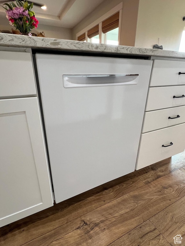 12137 N Montrose Dr, Highland, UT 84003 - kitchen view of dishwasher, white cabinetry, and dark wood finished floors