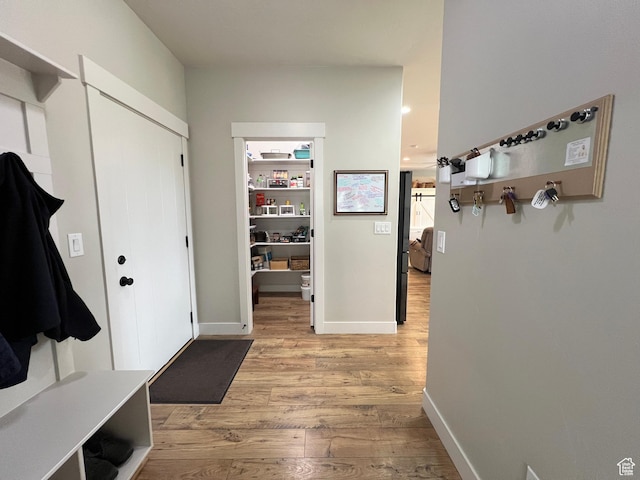 12137 N Montrose Dr, Highland, UT 84003 - mudroom with light wood-type flooring and baseboards