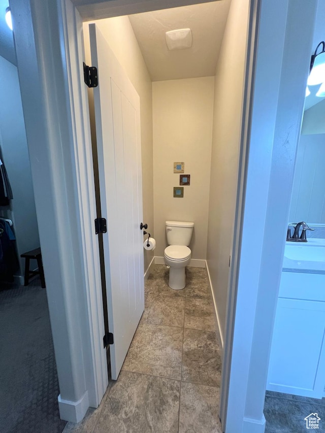 12137 N Montrose Dr, Highland, UT 84003 - bathroom featuring toilet and a sink