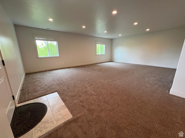12137 N Montrose Dr, Highland, UT 84003 - carpeted empty room with healthy amount of natural light, recessed lighting, and baseboards
