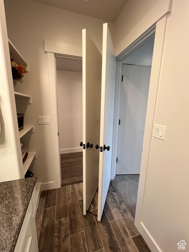 12137 N Montrose Dr, Highland, UT 84003 - corridor with dark wood-style floors and baseboards