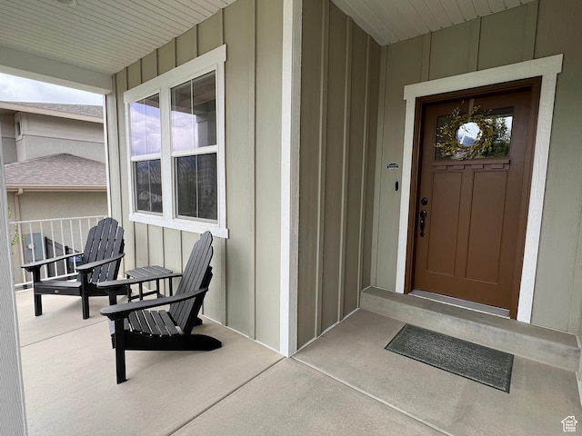 12137 N Montrose Dr, Highland, UT 84003 - view of exterior entry featuring board and batten siding and a porch