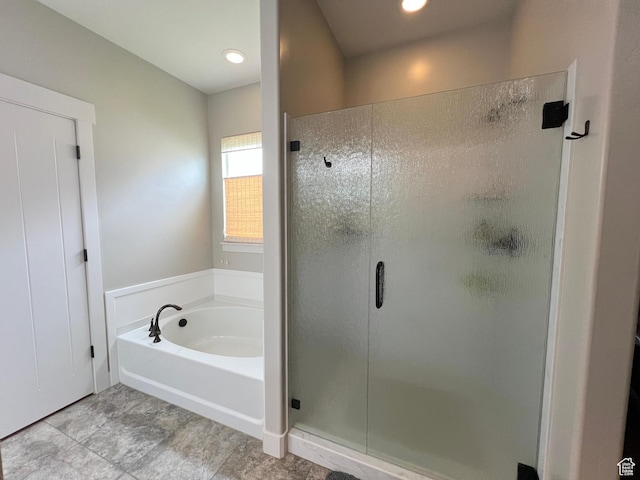 12137 N Montrose Dr, Highland, UT 84003 - bathroom with a shower stall, a garden tub, and recessed lighting