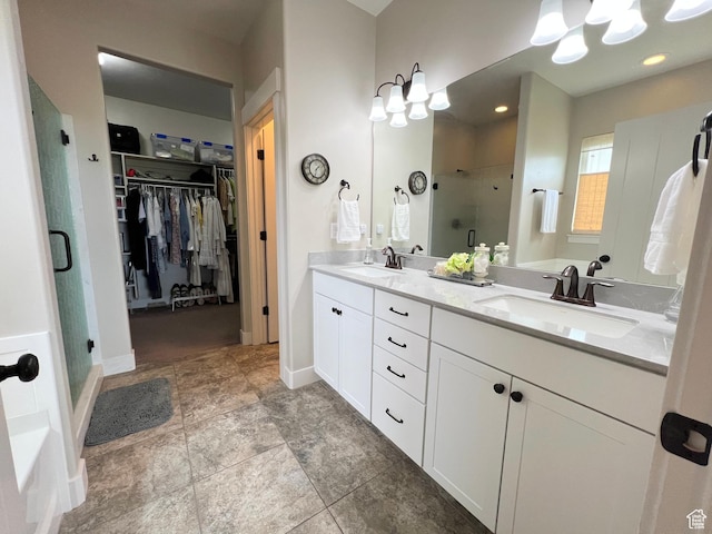 12137 N Montrose Dr, Highland, UT 84003 - bathroom featuring a shower stall, double vanity, a walk in closet, and a chandelier