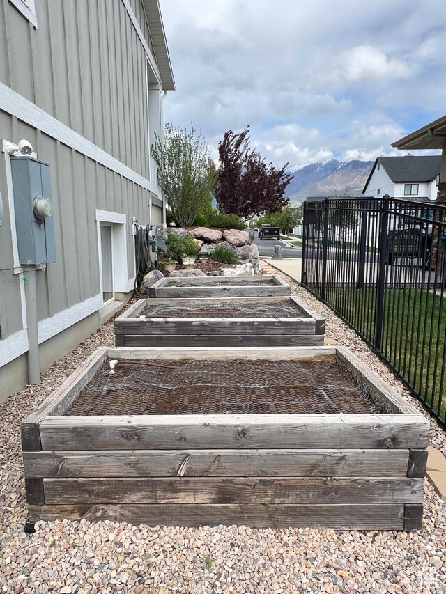 12137 N Montrose Dr, Highland, UT 84003 - view of yard with a vegetable garden and a mountain view
