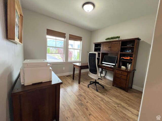 12137 N Montrose Dr, Highland, UT 84003 - office featuring light wood-style floors and baseboards