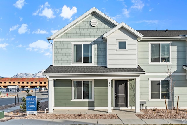 122 N Seaside St Unit 2319, Saratoga Springs, UT 84045 - view of front of house with a mountain view and a shingled roof