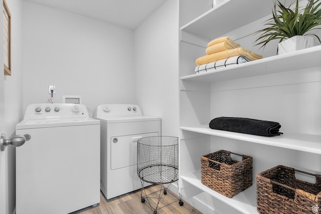 122 N Seaside St Unit 2319, Saratoga Springs, UT 84045 - laundry area featuring separate washer and dryer and light wood-type flooring