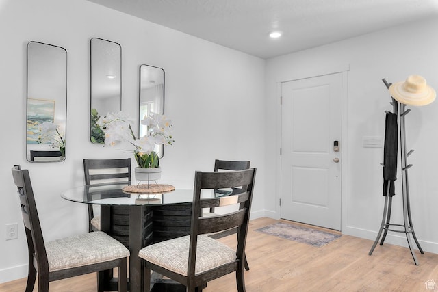 122 N Seaside St Unit 2319, Saratoga Springs, UT 84045 - dining space featuring light wood finished floors, baseboards, and recessed lighting