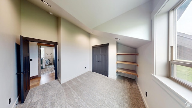 1164 S 1600 E, Preston, ID 83263 - bonus room featuring washing machine and clothes dryer, healthy amount of natural light, carpet floors, baseboards, and high vaulted ceiling