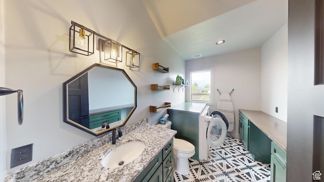 1164 S 1600 E, Preston, ID 83263 - bathroom with vanity, toilet, tile patterned floors, and recessed lighting