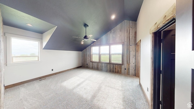 1164 S 1600 E, Preston, ID 83263 - additional living space featuring vaulted ceiling, a ceiling fan, carpet flooring, baseboards, and wood walls