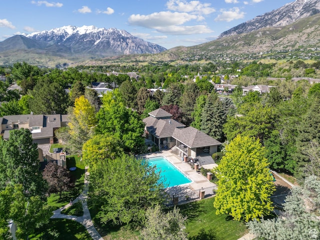 3263 Shadowbrook Cir N, Provo, UT 84604 - aerial view of a mountain backdrop and a pool