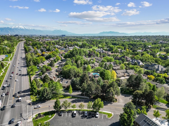 3263 Shadowbrook Cir N, Provo, UT 84604 - aerial view of property and surrounding area featuring a mountain backdrop, nearby suburban area, and a main thoroughfare