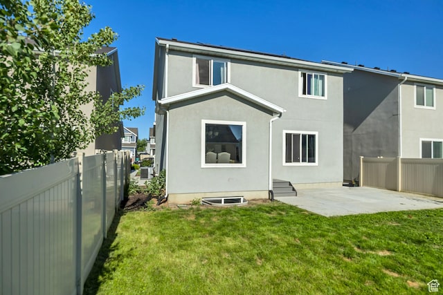 2466 S 2200 W, West Haven, UT 84401 - back of house featuring stucco siding and a patio