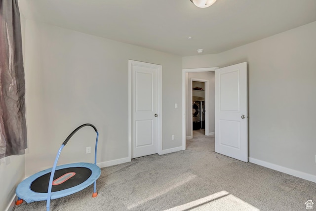 2466 S 2200 W, West Haven, UT 84401 - unfurnished bedroom with independent washer and dryer, carpet, and baseboards