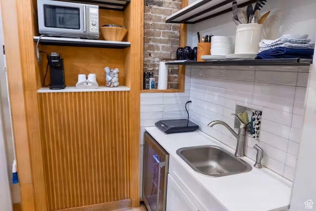 161 W 200 S, Provo, UT 84601 - kitchen with a sink, tasteful backsplash, stainless steel microwave, open shelves, and light countertops