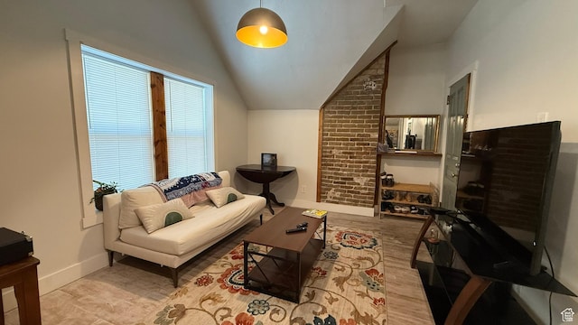 161 W 200 S, Provo, UT 84601 - living area featuring plenty of natural light, baseboards, vaulted ceiling, and wood finished floors