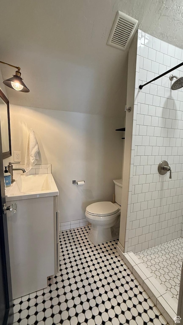 161 W 200 S, Provo, UT 84601 - full bath featuring vanity, toilet, a shower stall, and tile patterned flooring