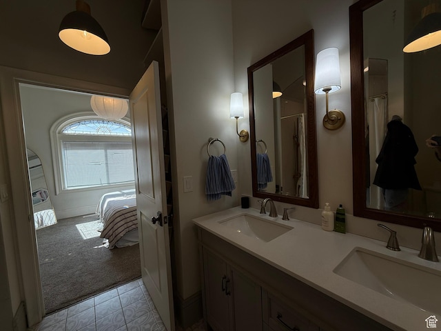 161 W 200 S, Provo, UT 84601 - ensuite bathroom featuring double vanity and tile patterned flooring
