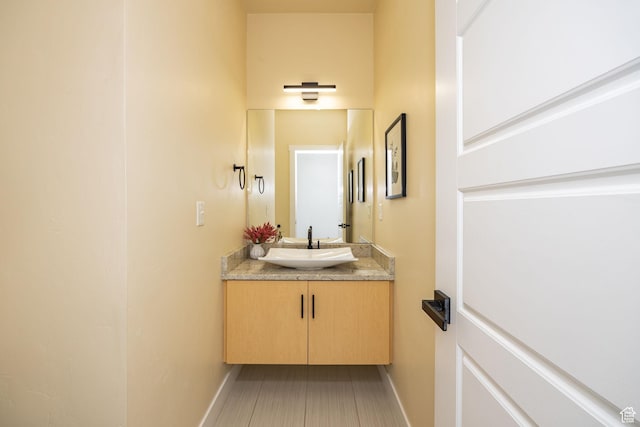 181 W 400 S, Hyrum, UT 84319 - bathroom with vanity and baseboards