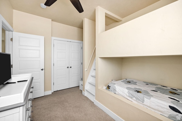 181 W 400 S, Hyrum, UT 84319 - bedroom featuring light colored carpet, a closet, baseboards, and a ceiling fan