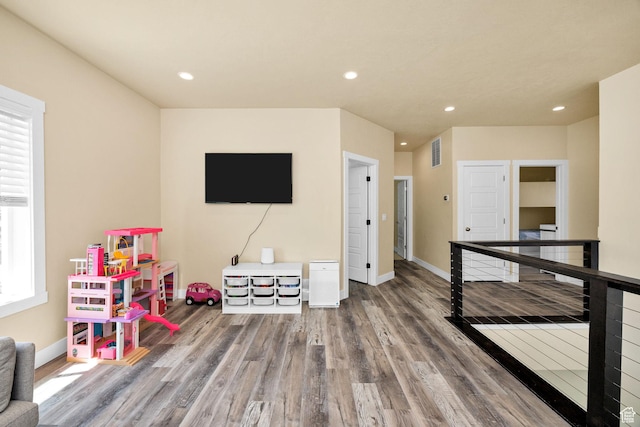 181 W 400 S, Hyrum, UT 84319 - game room featuring wood finished floors, recessed lighting, and baseboards