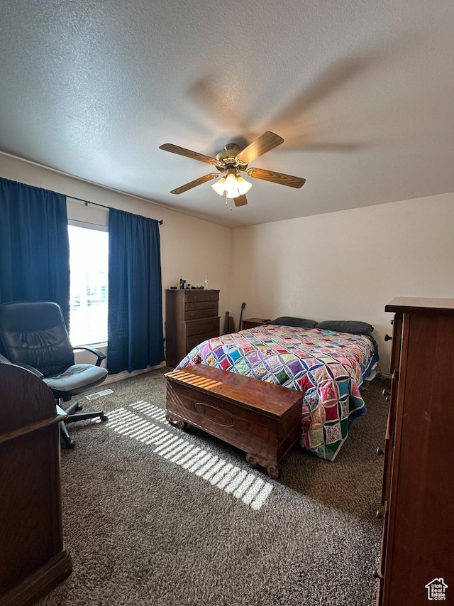 853 S 860 W, Tooele, UT 84074 - carpeted bedroom featuring ceiling fan and a textured ceiling