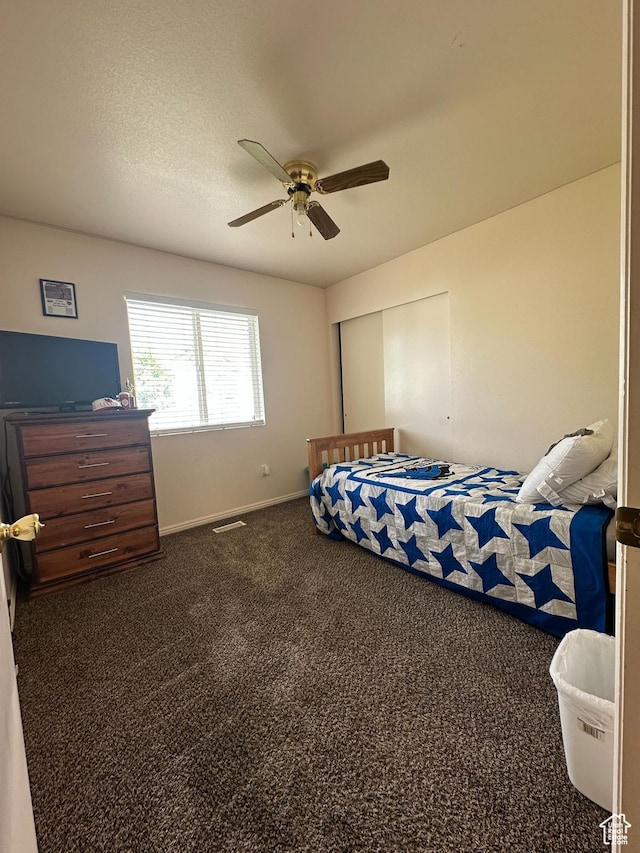 853 S 860 W, Tooele, UT 84074 - carpeted bedroom with baseboards and ceiling fan