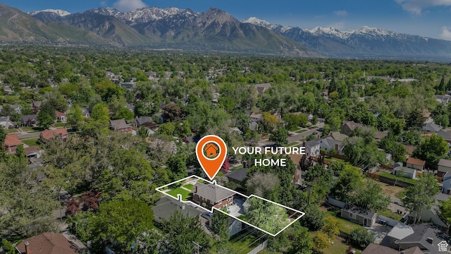 2504 S Dearborn St E, Salt Lake City, UT 84106 - aerial perspective of suburban area with property parcel outlined and a mountain backdrop