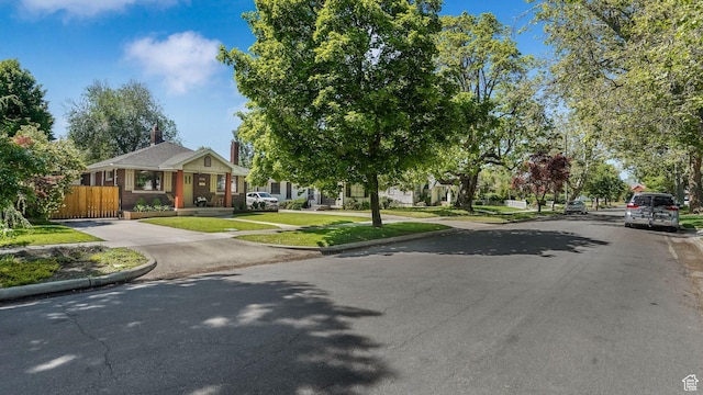 2504 S Dearborn St E, Salt Lake City, UT 84106 - view of asphalt road featuring curbs and sidewalks