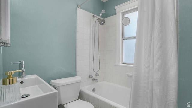 2504 S Dearborn St E, Salt Lake City, UT 84106 - bathroom featuring tiled shower / bath combo, a sink, and toilet