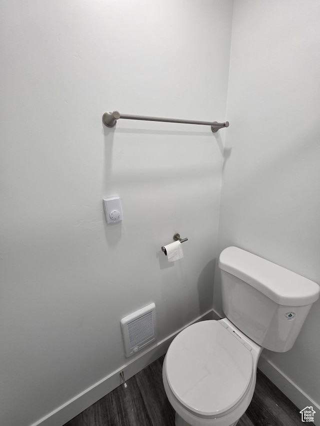 2092 N Red Yearling Dr, Saratoga Springs, UT 84045 - bathroom with baseboards, wood finished floors, and toilet