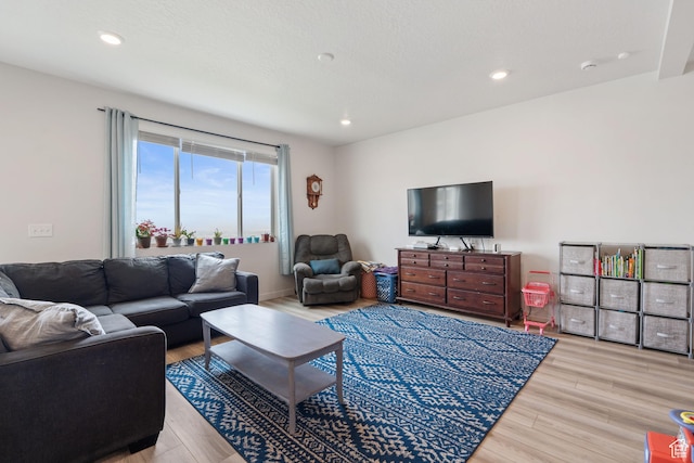 2092 N Red Yearling Dr, Saratoga Springs, UT 84045 - living room with light wood finished floors and recessed lighting