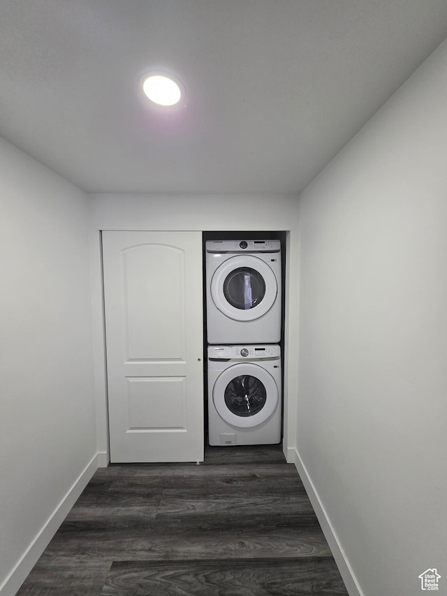 2092 N Red Yearling Dr, Saratoga Springs, UT 84045 - laundry area with stacked washer / dryer, baseboards, and dark wood-style floors