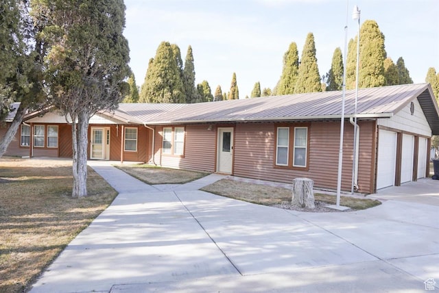731 Pioneer Dr, Soda Springs, ID 83276 - ranch-style home with metal roof and concrete driveway